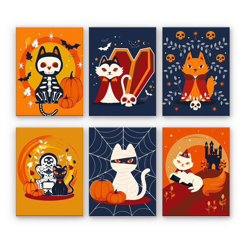 Halloweenowe koty w kostiumach